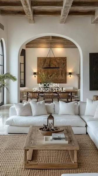 Modern Spanish living room with textured walls and arches